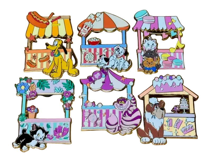 Set of cartoon character-themed magnets on a white surface