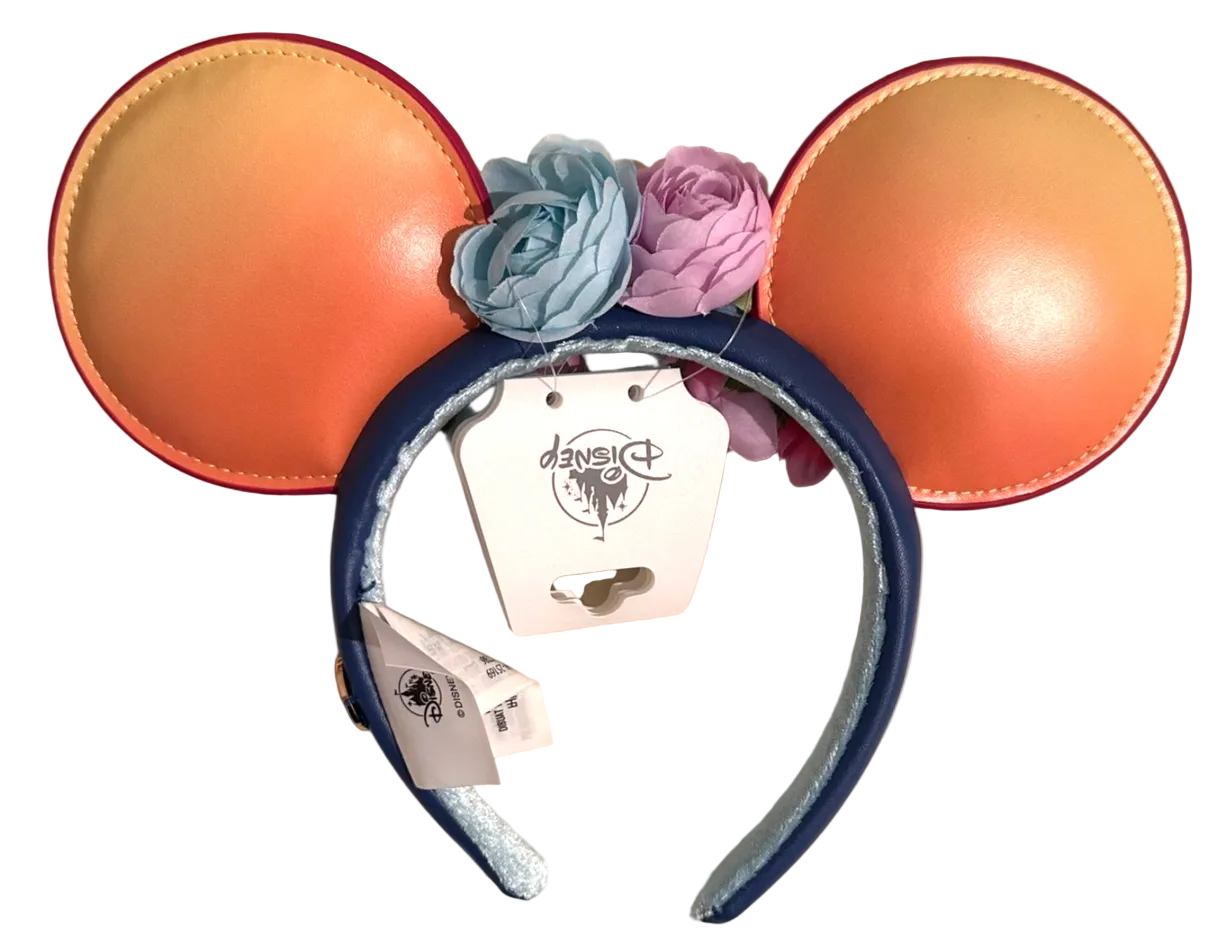 Mouse ears headband with flowers and a tag on a white background