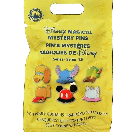 Yellow packaging of Disney Magical Mystery Pins with pins displayed on a white background