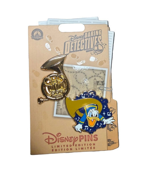Two Disney pins on a display card with 'Disney Pins' branding on a white background.