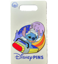 A Disney Pins collectible enamel pin of Stitch in a space rocket, mounted on a white display card with a Disney Parks logo in the top left and the Disney Pins brand name at the bottom.