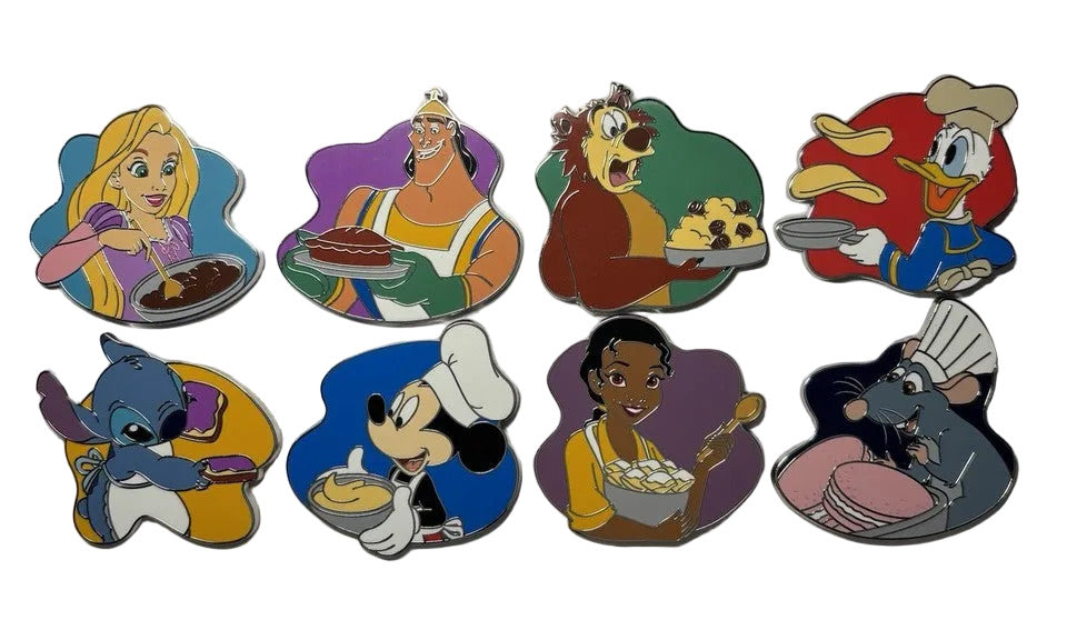 Set of Disney character pins on a white background